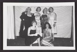 [Susanna in a leopard print dress with five friends on the stage at Chevalier d'Eon, Hunter, NY]
