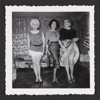 [Susanna and two friends showing some leg in Susanna and Marie’s New York City apartment]
