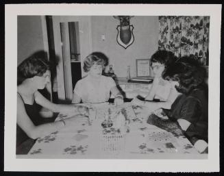[Carlene, Gail, Edith, and Audrey playing Scrabble, Chevalier d'Eon, Hunter, NY]
