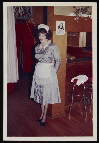 [Vicki in a maid's outfit, Chevalier d'Eon, Hunter, NY]

