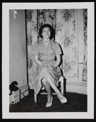 [Edith sitting in front of patterned curtains, Chevalier d’Éon, Hunter, NY]
