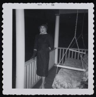 [Unnamed crossdresser on the porch at night, Chevalier d’Éon, Hunter, NY]
