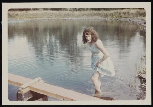 [Susanna wading at the edge of the pond, Casa Susanna, Hunter, NY]
