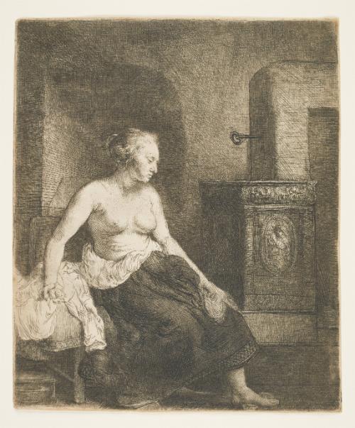 Woman Sitting Half Dressed Beside a Stove