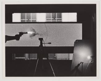 silhouette gun firing