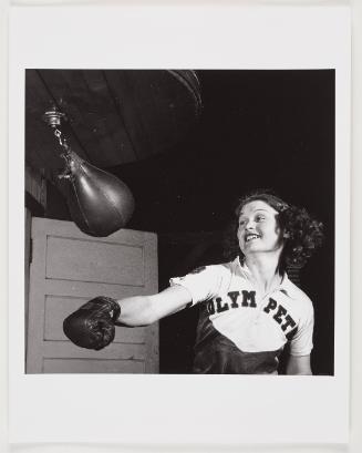Irish Woman Hitting Punching Bag