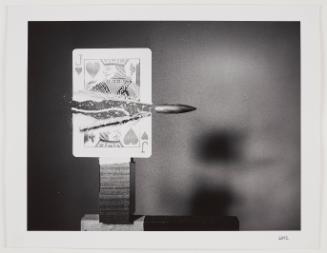 6002 (bullet through jack of hearts)