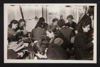 Black Watch hold sports whilst resting - Tommy never forgets a race for the little French children. Waiting to receive their prizes