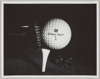 golf club strikes ball