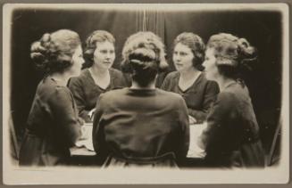 [Young woman with glasses]