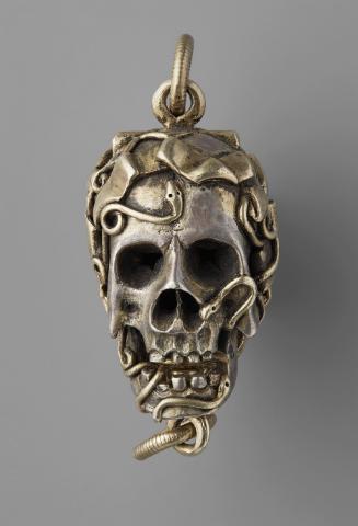 Partly Gilded Silver Double-Sided Amulet of a Man's Face and Skull