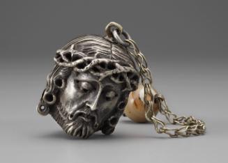 Silver and Agate Double-Sided Amulet of a Man's Face and Skull